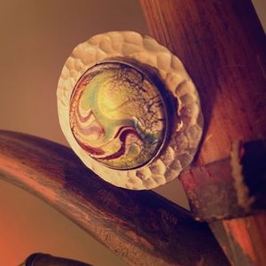 Big silver ring with artistic glass middle